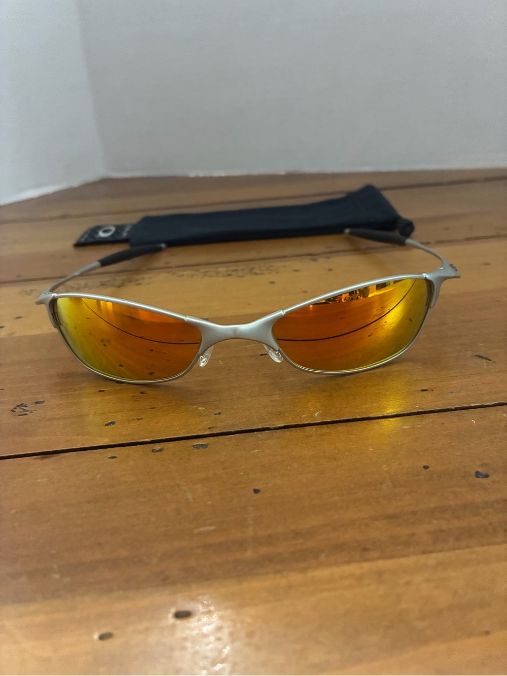 Oakley Silver Frame Sunglasses with Orange Mirrored Lenses - Women Accessories